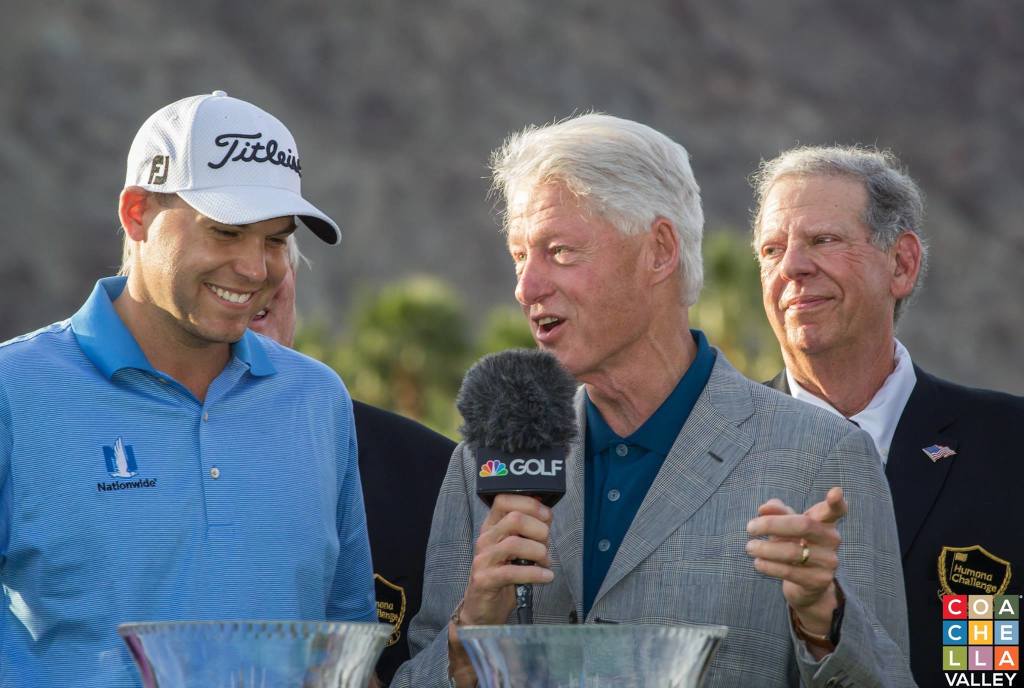 Former President Bill Clinton congratulates Bill Haas on his Humana Challenge 15' win.