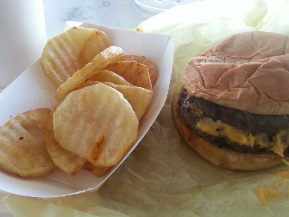 Awesome fries along with a double cheeseburger with pastrami. Don't forget a date shake! Tom J. Burger Box